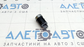 The Start-Stop button on a VW Tiguan 18-21 is worn and scratched.