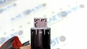 The Start-Stop button on a VW Tiguan 18-21 is worn and scratched.