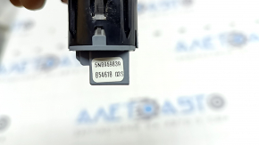 The Start-Stop button on a VW Tiguan 18-21 is worn and scratched.