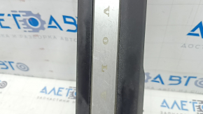 Volvo XC90 16-23 black front right inner door sill with illuminated chrome insert, scratches
