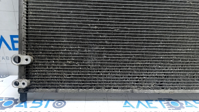 The air conditioner condenser radiator of the Toyota Prius V 12-17 has fallen out.