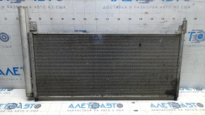 The air conditioner condenser radiator of the Toyota Prius V 12-17 has fallen out.