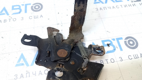 The hood lock on a Toyota Prius V 12-17 is rusty.