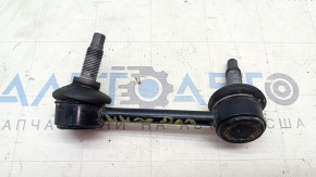 The rear right stabilizer link of a Kia EV6 22-24 has a torn boot.