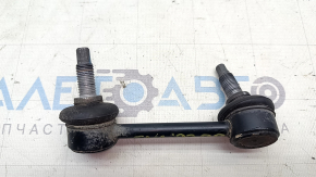 The rear right stabilizer link of a Kia EV6 22-24 has a torn boot.