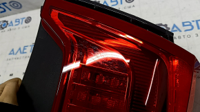 Volvo XC90 16-23 LED left outer fender light, crack in glass