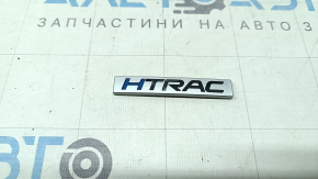 The HTRAC emblem on the tailgate of the Hyundai Tucson 19-21
