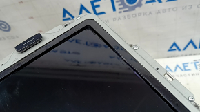 Volvo XC90 16-25 navigation display monitor is worn and scratched.