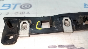 Front bumper mount on the right fender of a Ford Escape MK3 2017-2019, broken mounts, non-factory hole