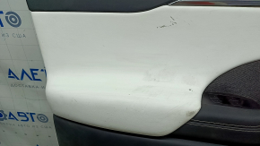 Tesla Model X 22-25 front left door panel, black, with white leather insert, scratches on plastic, tears in leather, broken fasteners, needs dry cleaning