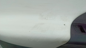 Tesla Model X 22-25 front left door panel, black, with white leather insert, scratches on plastic, tears in leather, broken fasteners, needs dry cleaning