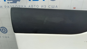 Tesla Model X 22-25 front left door panel, black, with white leather insert, scratches on plastic, tears in leather, broken fasteners, needs dry cleaning