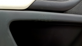 Tesla Model X 22-25 front left door panel, black, with white leather insert, scratches on plastic, tears in leather, broken fasteners, needs dry cleaning