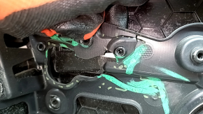 Tesla Model X 22-25 front left door panel, black, with white leather insert, scratches on plastic, tears in leather, broken fasteners, needs dry cleaning