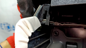Tesla Model X 22-25 front left door panel, black, with white leather insert, scratches on plastic, tears in leather, broken fasteners, needs dry cleaning