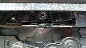 Tesla Model X 22-25 front left door panel, black, with white leather insert, scratches on plastic, tears in leather, broken fasteners, needs dry cleaning