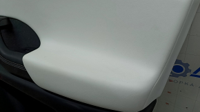 Tesla Model X 22-25 front right door panel, black, with white leather insert, broken fastener, needs cleaning, scuffs