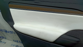 Tesla Model X 22-25 rear left door panel, black, with white leather insert, pierced cushion, dry-cleanable