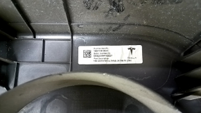 Tesla Model X 22-25 front left door panel, black, with white leather insert, scratches on plastic, tears in leather, broken fasteners, needs dry cleaning