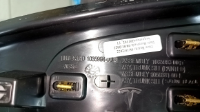 Tesla Model X 22-25 black, scuffed, lower trunk opening trim with scratches