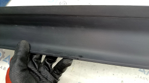 Tesla Model X 22-25 right outer trunk opening trim scratches