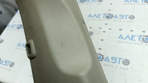 Left upper center pillar trim for Toyota Sienna 11-20 beige button trim, worn, needs cleaning