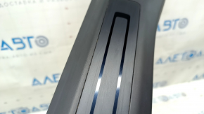 Tesla Model X 22-25 front right inner door sill plate with scratches and scuffs