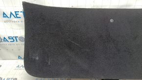 Tesla Model X 22-25 black lower tailgate trim with scuffs and scratches