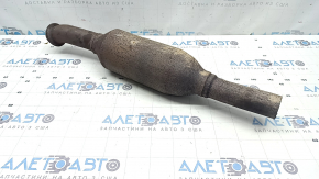 The rear catalytic converter of a Ford Escape MK4 2023-25 hybrid is sawn off, rusty, and dented.