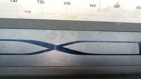 Tesla Model X 22-25 rear left door sill plate: scratches, dents on the plate, broken fastener