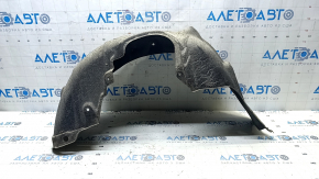 The rear left fender liner of a Toyota Prius 50 16-22 is torn.