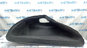The front trunk liner of the Tesla Model X 22-25 is worn, needs dry cleaning, and is creased.