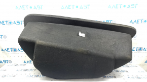 The front trunk liner of the Tesla Model X 22-25 is worn, needs dry cleaning, and is creased.