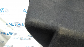 The front trunk liner of the Tesla Model X 22-25 is worn, needs dry cleaning, and is creased.