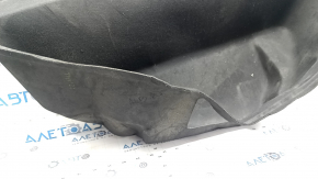 The front trunk liner of the Tesla Model X 22-25 is worn, needs dry cleaning, and is creased.