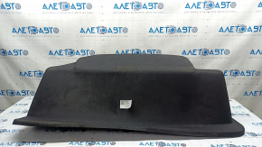 The front trunk liner of the Tesla Model X 22-25 is worn, needs dry cleaning, and is creased.