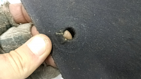 Jeep Grand Cherokee WL 21-25 hood insulation is torn and dented.