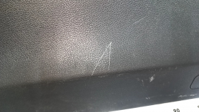 The lower trim panel of the tailgate of a Hyundai Tucson 16-21 is black, scratches, and the fastener is broken.