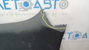 The lower trim panel of the tailgate of a Hyundai Tucson 16-21 is black, scratches, and the fastener is broken.