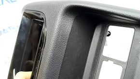 Jeep Grand Cherokee WL 22-25 rear center console trim, black, under USB Hub and rear row heating buttons, scratches