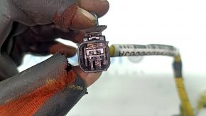 Wiring for the front right airbag sensor on a Kia Optima 16-20