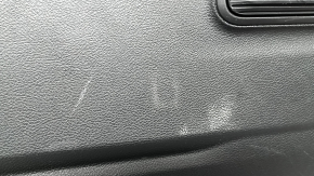 Jeep Grand Cherokee WL 22-25 black lower tailgate trim for speakers, with lamps, broken fasteners, worn, whitened plastic