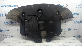 The engine protection of the Hyundai Tucson 16-21 is worn, torn, and dented.