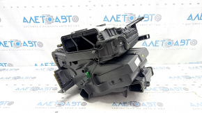 The bare heater housing of a Kia Optima 2016-2018 air conditioner.