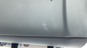 The rear passenger seat backrest trim for the Tesla Model X 22-25 is black, scuffed, and the mount is broken.