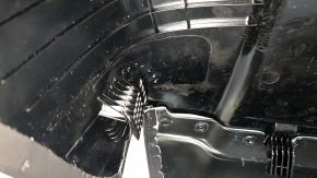 The rear passenger seat backrest trim for the Tesla Model X 22-25 is black, scuffed, and the mount is broken.