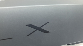 Tesla Model X 22-25 rear left upper door frame trim scratches