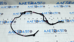 Wiring harness in the front left pillar of a Tesla Model X 22-25