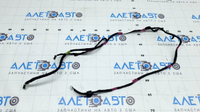 Wiring harness in the front left pillar of a Tesla Model X 22-25
