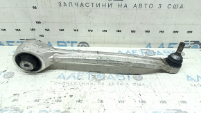 Tesla Model X 22-25 lower left front control arm has a torn boot.